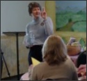 Ann speaking at a seminar